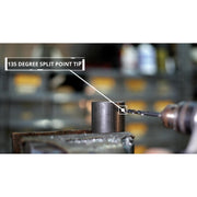 A close-up of a metal cylinder being drilled with a drill bit, with a text label reading '135 DEGREE SPLIT POINT TIP' pointing to the tip of the drill bit.
