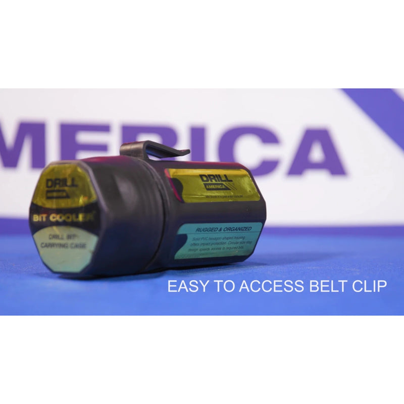 A black and dark gray Drill Bit Cooler camping case with a yellow and green label, featuring a belt clip, shown on a blue surface with a blurred background and text overlay 'EASY TO ACCESS BELT CLIP'.
